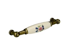 Uchwyty Uchwyt UP21 - mosiądz patynowany, porcelana mleczna z kwiatem / rozstaw 96 mm - Gamet
